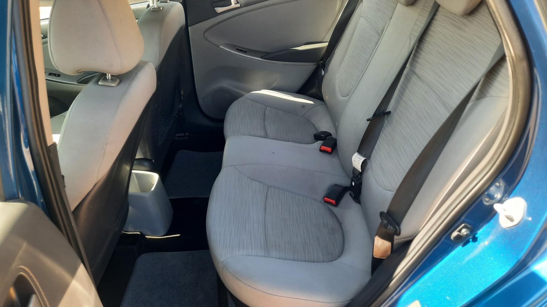 2017 Blue /Gray Hyundai Accent SE 4-Door 6M (KMHCT4AE1HU) with an 1.6L L4 DOHC 16V engine, Automatic 6-Speed transmission, located at 16710 Clay Rd., Houston, TX, 77084, (281) 859-7900, 29.834864, -95.656166 - Photo#8